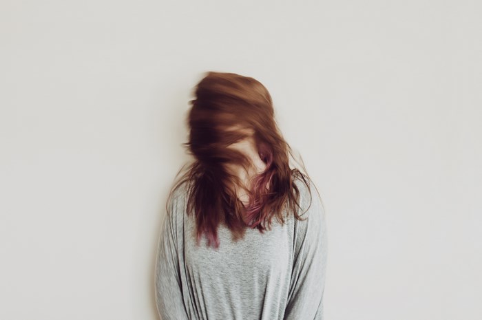 Dynamic Motion Portrait of Woman with Flowing Hair