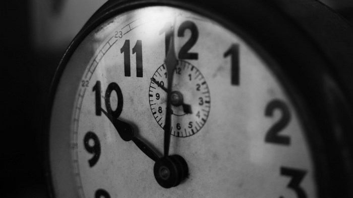 Close-up of an antique analog clock face