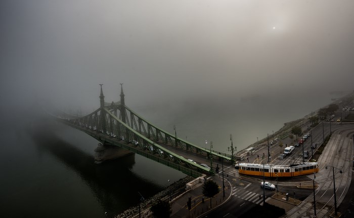 Budapest bridge and tram in fog