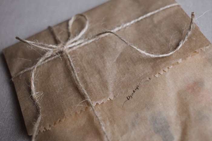 Brown paper package tied with twine