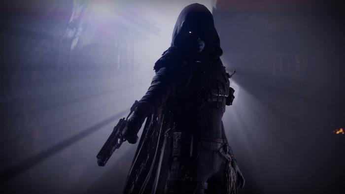 Hunter with glowing eyes holding a gun in Destiny 2: Forsaken
