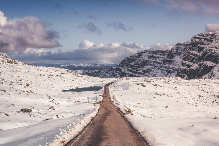 Snowy mountain road in Scotland