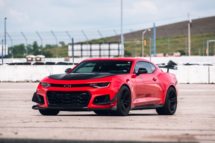Red Chevrolet Camaro ZL1 Muscle Car on Track