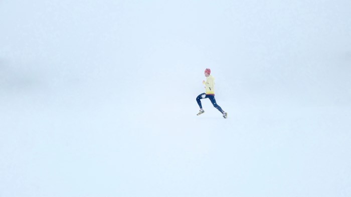 Person running in the snow