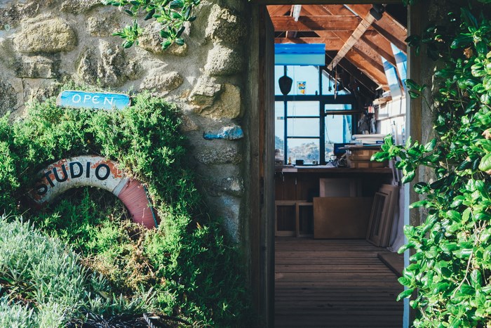 Open Studio with Stone Wall and Greenery