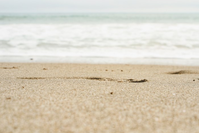 Sand and Waves on a Beach
