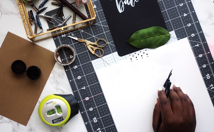 Calligraphy tools on a marble desk