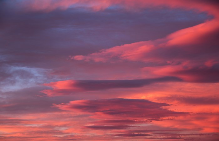 Pink and purple clouds at sunset over Slovenia