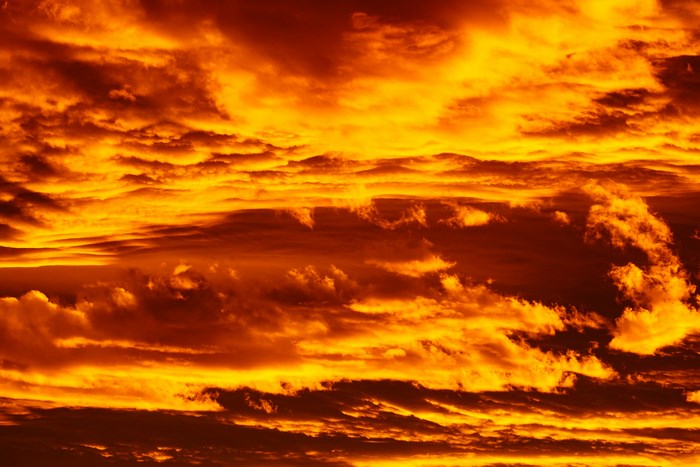 Fiery orange clouds at sunset in Colorado