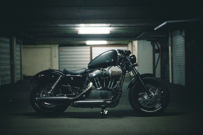 Black Harley-Davidson Motorcycle in a Garage