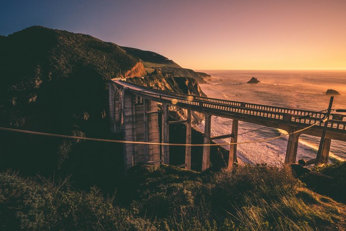Bixby Bridge at sunset over the Pacific Ocean