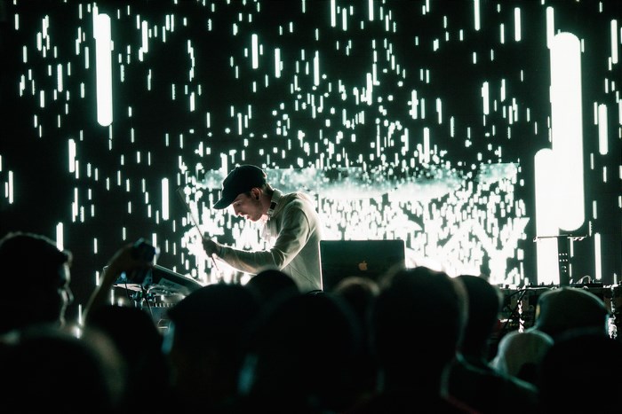 Said The Sky performing live with a digital background