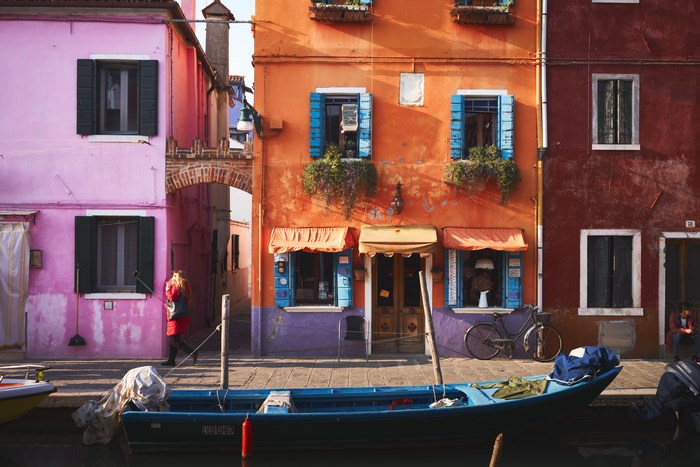 Colorful buildings and boats in Burano, Venice