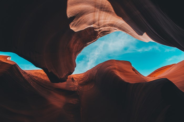 Antelope Canyon with blue sky and clouds