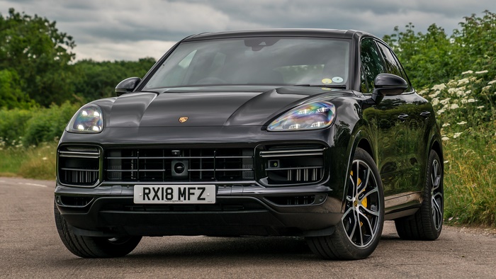 Black Porsche Cayenne Turbo SUV on a Road