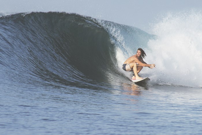Man surfing a large wave