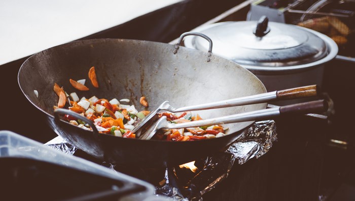 Wok Stir-Fry with Fresh Vegetables on Stove