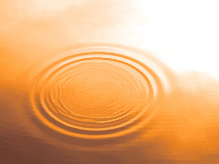 Orange water ripple with golden light