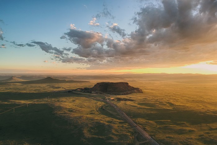 Aerial view of a flat-topped mountain at sunrise