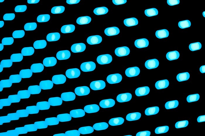Blue oval lights pattern on black background