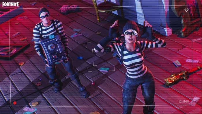 Fortnite characters in burglar outfits with a safe