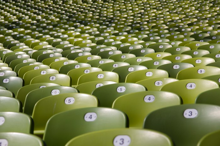 Empty stadium seats in rows