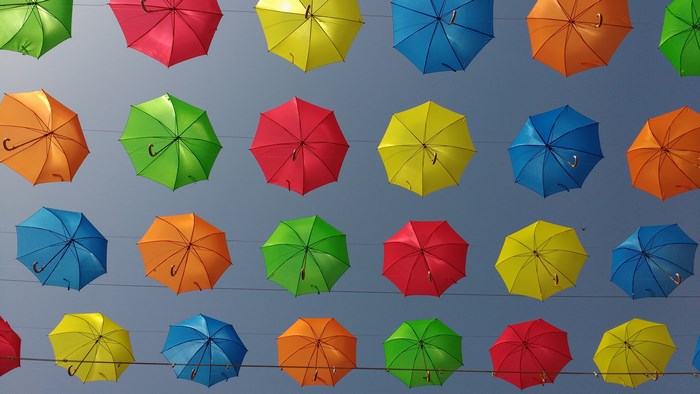 Colorful umbrellas suspended in the sky