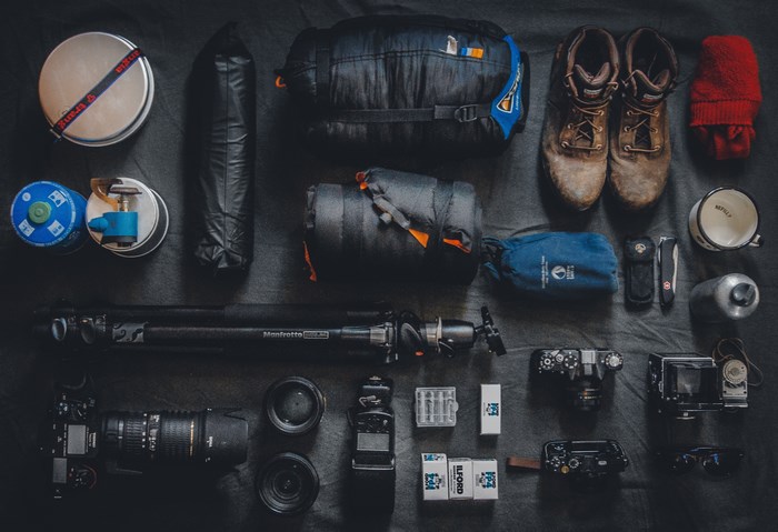 Camping and Photography Gear Flatlay with Manfrotto Tripod