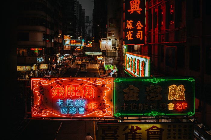 Hong Kong street with neon signs at night