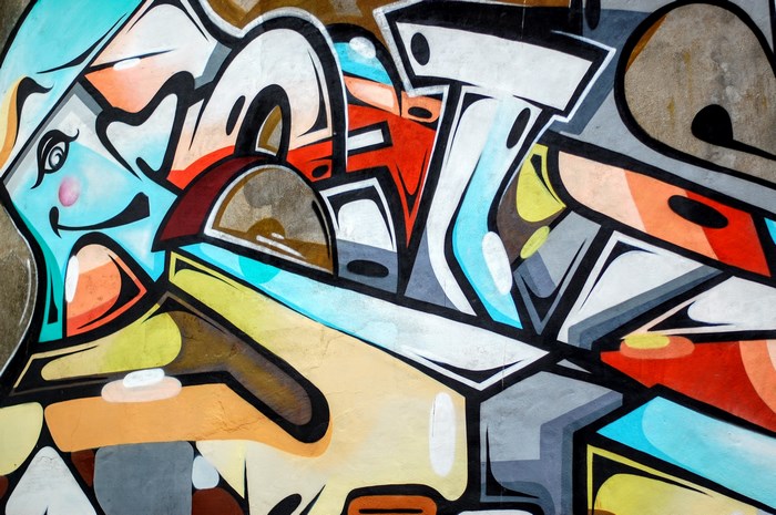 Graffiti art on a textured wall