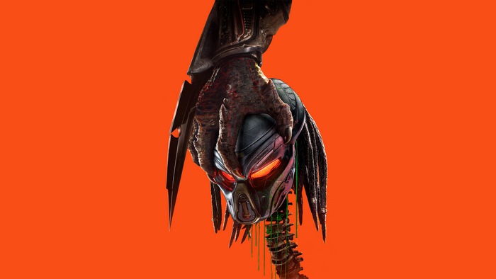 Predator holding a severed head from The Predator