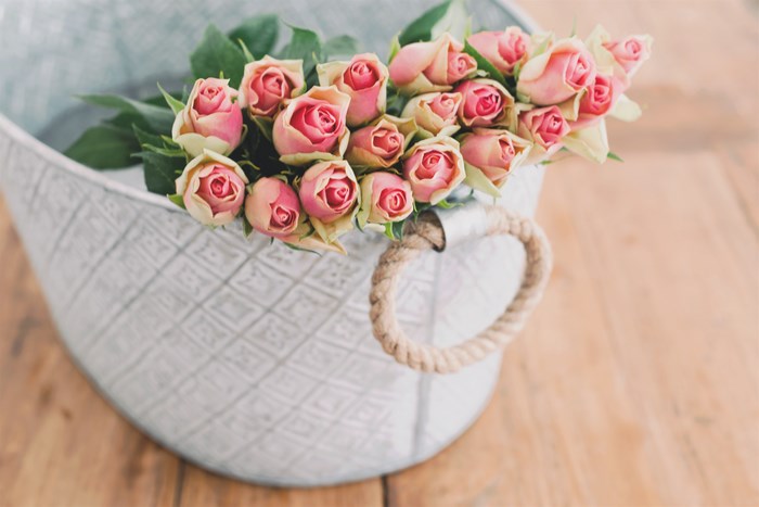 Bouquet of Pink Roses in Decorative Basket