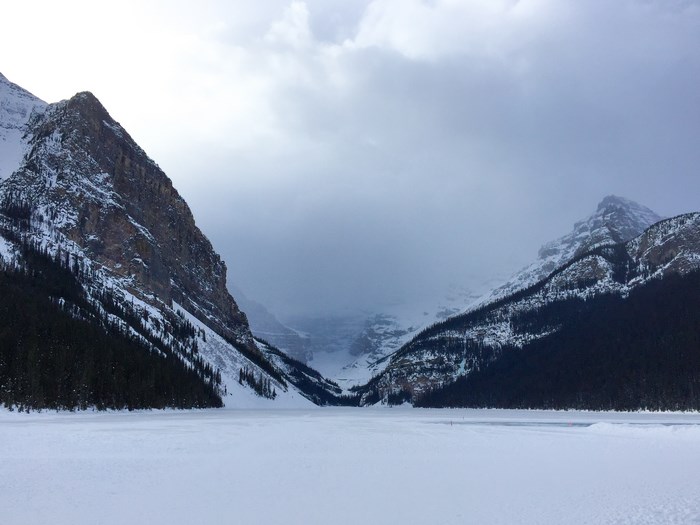 Snowy Mountains and Frozen Lake in Banff National Park