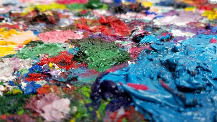 Close-up of a colorful oil paint palette