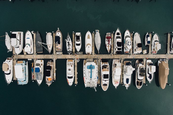 Aerial view of yachts docked at a marina