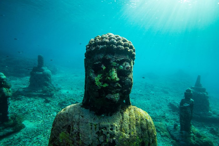 Underwater Buddha Statues in the Ocean