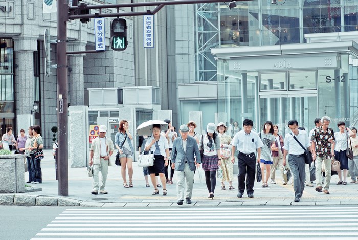 People crossing street in Sapporo, Japan