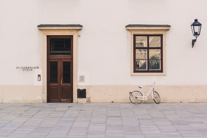Bicycle parked outside a building in Vienna