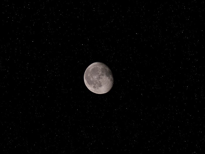Moon and stars in the night sky