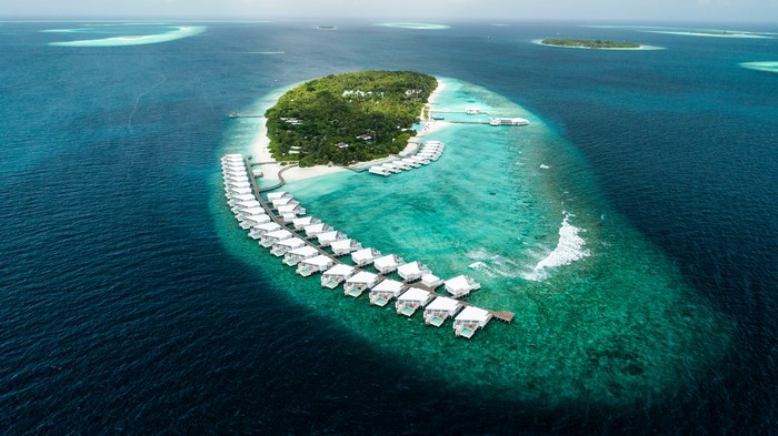 Aerial view of a tropical island resort in the Maldives