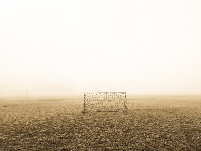 Soccer goals on a foggy field