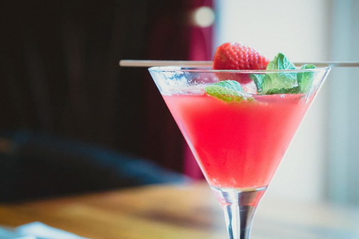 Strawberry and mint cocktail in a martini glass
