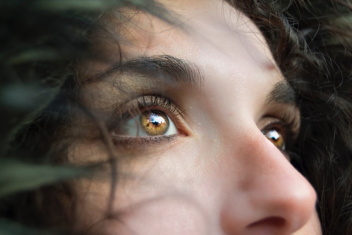 Close up of a woman's eye and nose