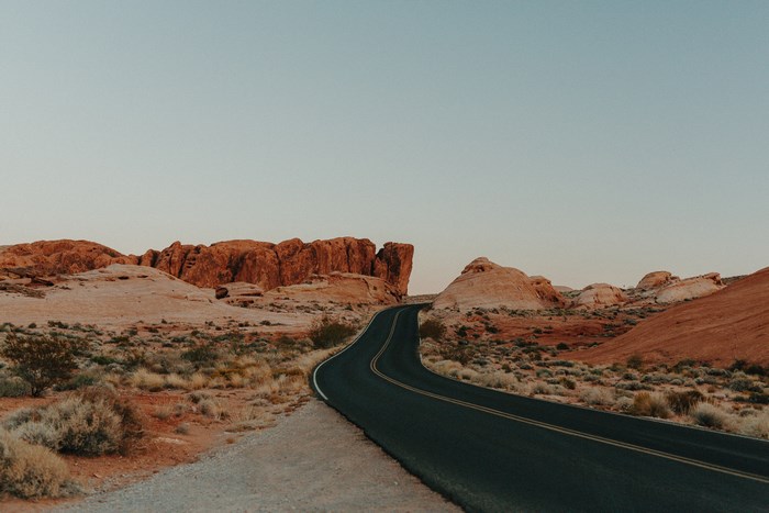 Empty road through Valley of Fire State Park, USA