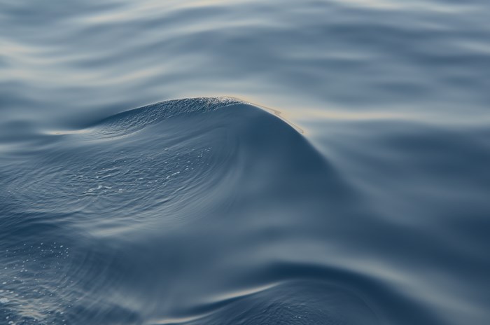 Close-up of a small wave on the ocean surface