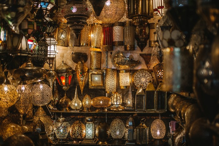 Moroccan shop filled with ornate metal lamps