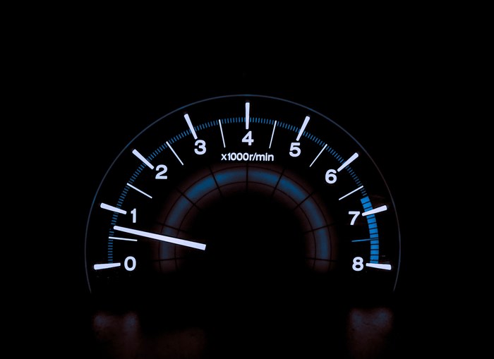 Car tachometer with needle at 1000 RPM