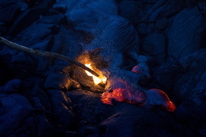 Stick igniting lava flow in Hawaii
