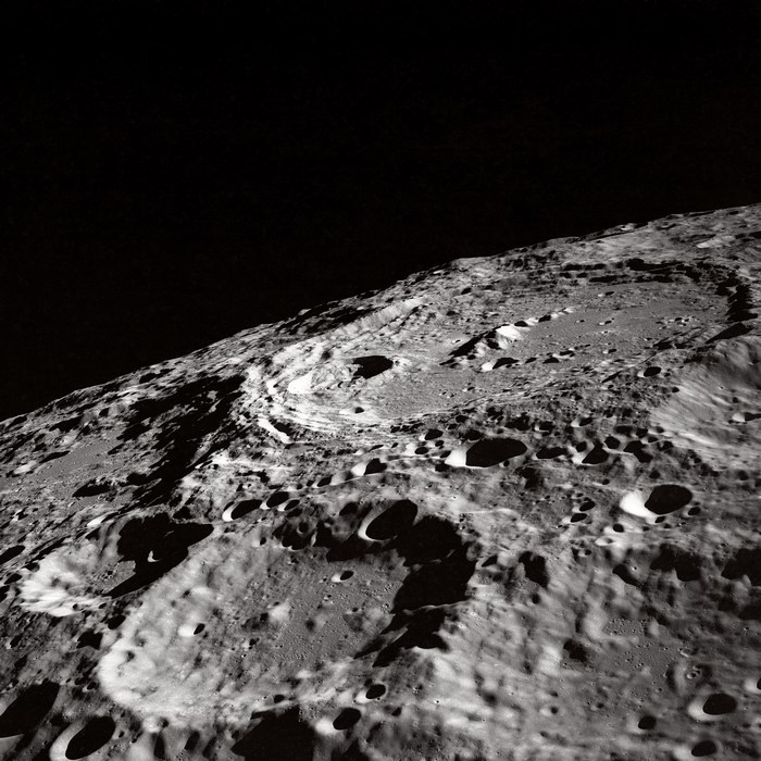 Lunar surface with craters and shadows