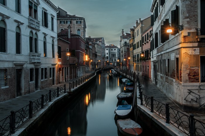 Evening Canal with Gondolas and Historic Buildings